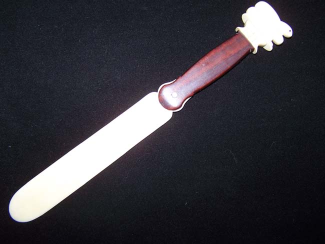 An Outstanding 19th century Sailor-made Ivory mounted Letter Opener with 'coiled serpent' ivory knob